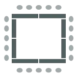 tables arranged in a square formation with chairs around them